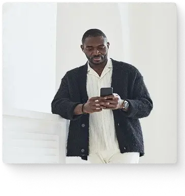 Man reviewing health insurance quotes on his phone