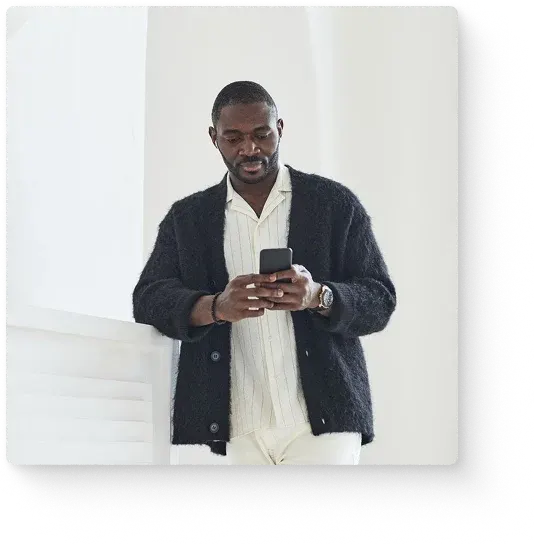 Man reviewing health insurance quotes on his phone